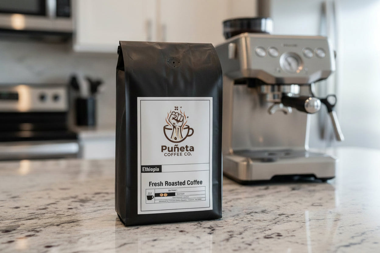 Black coffee bag with Puñeta Coffee Co. label