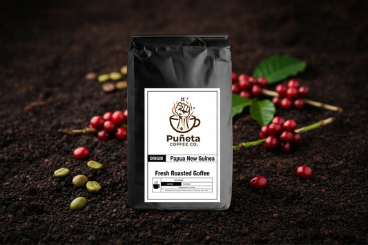 Black coffee bag with Puñeta Coffee Co. 