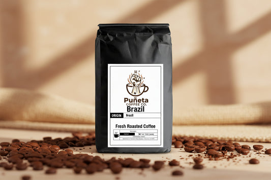 Black coffee bag with Puñeta Coffee Co. label